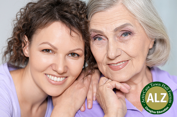 adult daughter and mother smiling